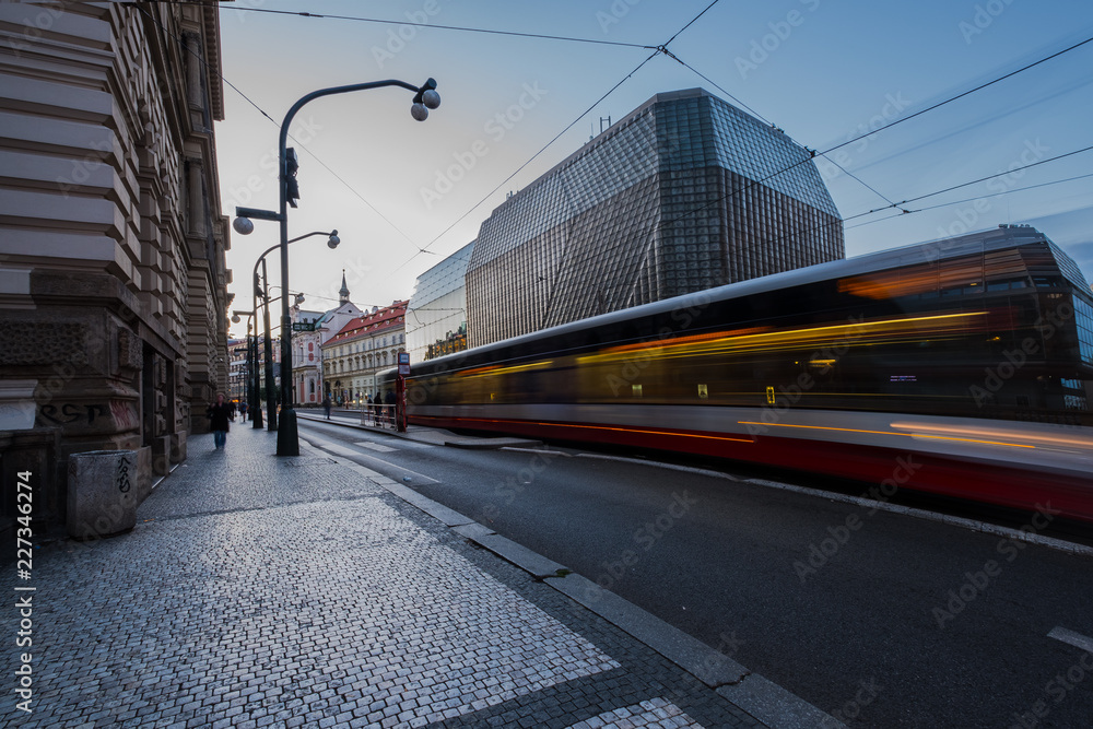 Prague, the tram departs from the stop in the background of the National Theater building