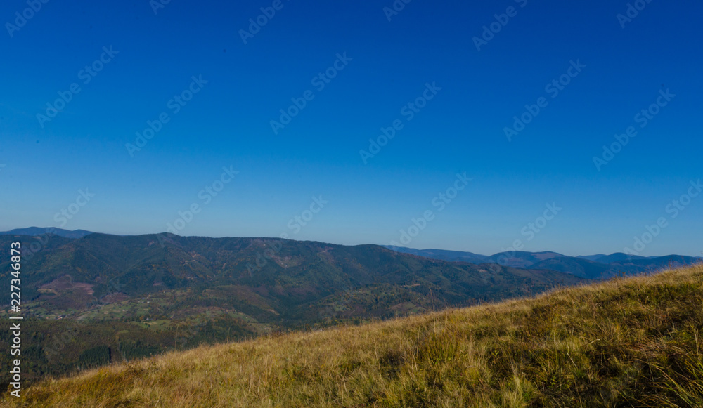 Carpathian mountains in sunny day in the autumn season