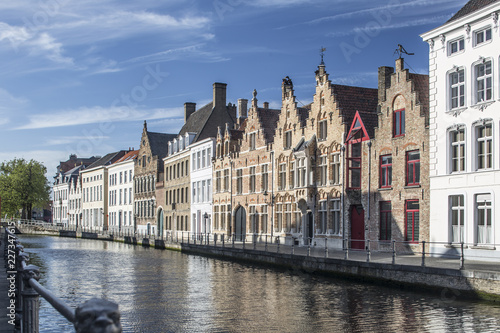 Sunny cityscape of old historical Belgium town Bruges. Urban landscape photography.