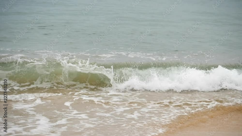 Waves on a sandy beach Waves on a sandy beach