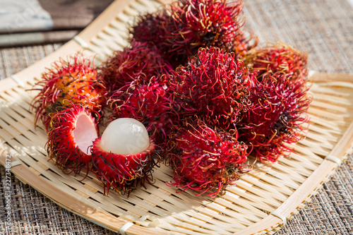 Fresh rambutan on basket photo