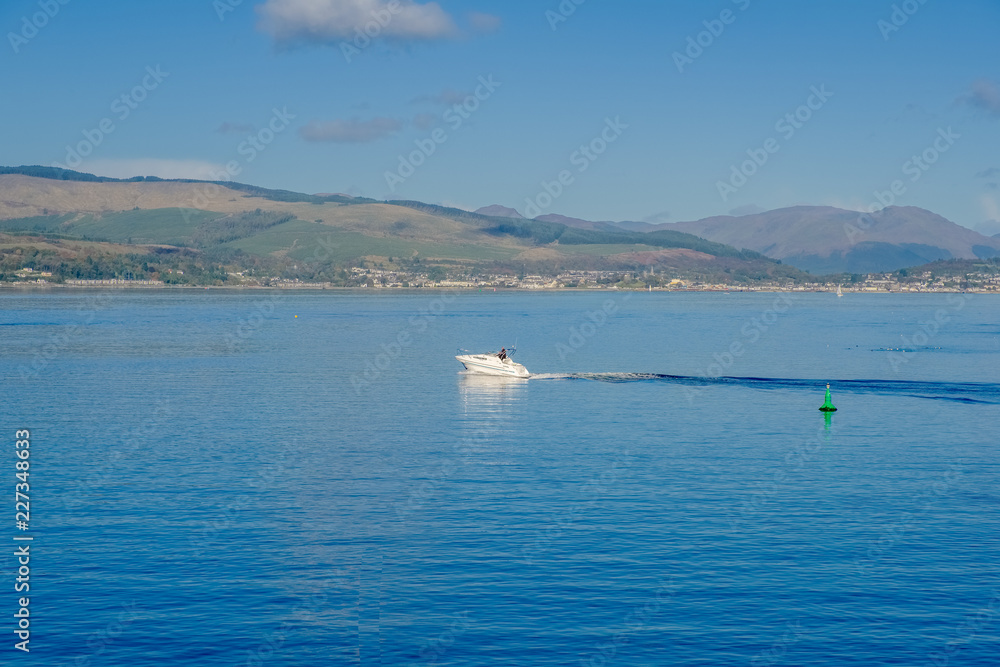 Small Speed Boat on the River Clyde in October Sunshine