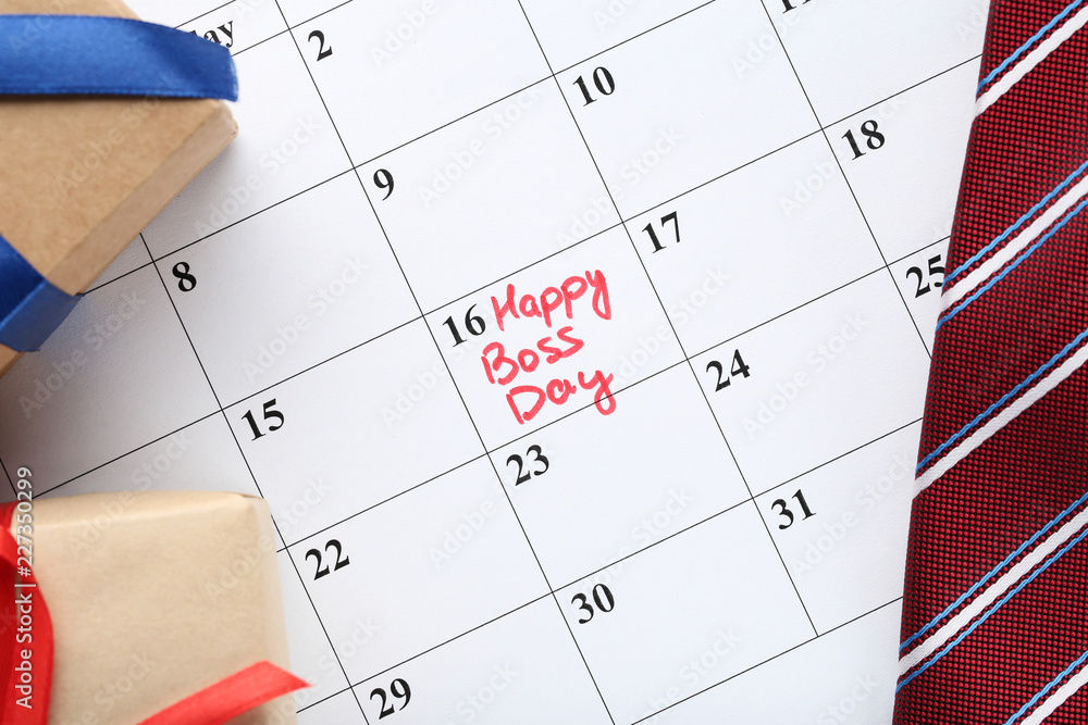 Inscription Happy Boss Day in calendar with gift boxes Inscription Happy Boss Day in calendar with gift boxes