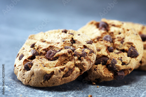 Chocolate cookies on rustic table. Chocolate chip cookies shot