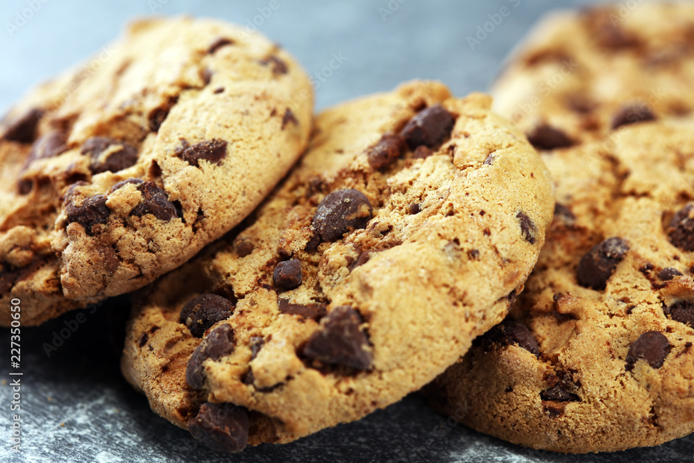 Chocolate cookies on rustic table. Chocolate chip cookies shot Chocolate cookies on rustic table. Chocolate chip cookies shot