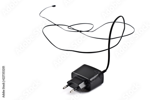 Mobile phone battery charger on white background.	