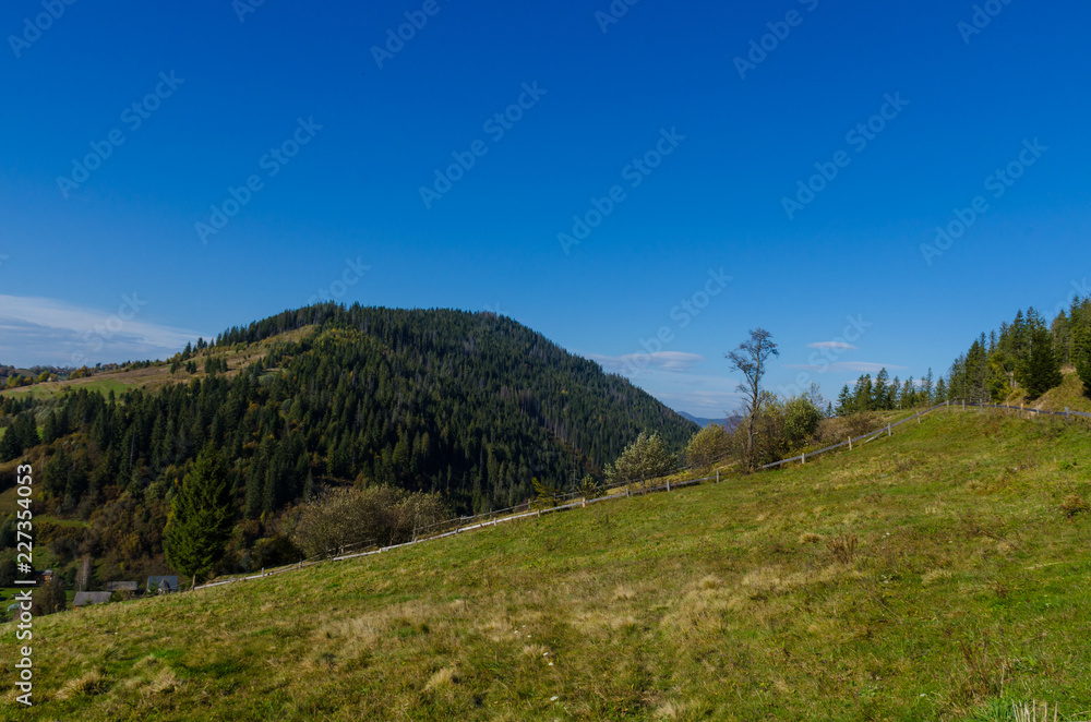 Carpathian mountains in sunny day in the autumn season