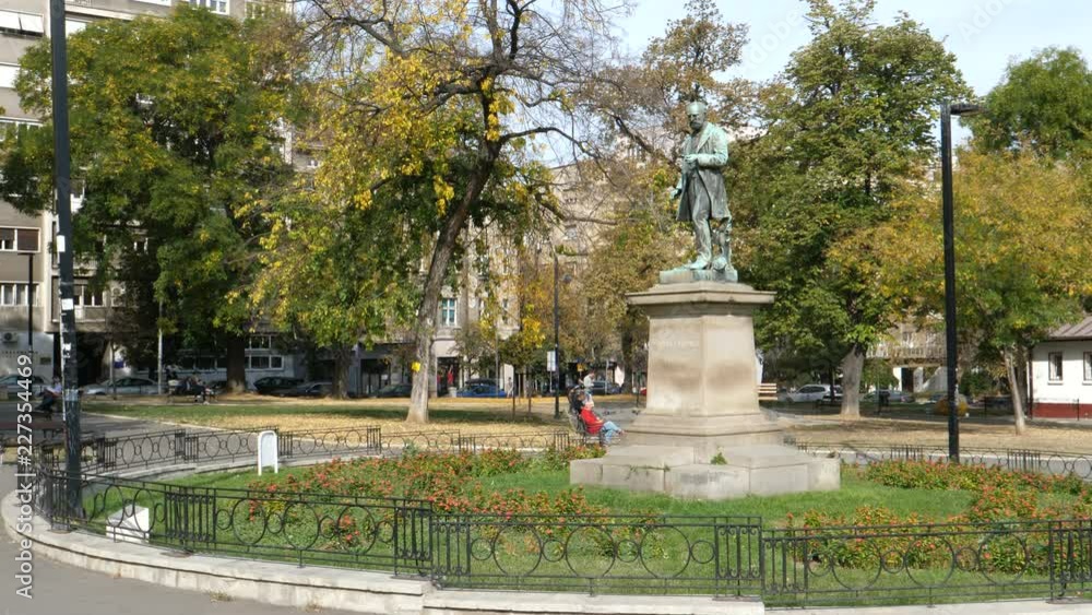 People at Studentski Park (Academic Park) famous park in Studentski Trg (Students Square). Built in 1927 on the place of Grand Market by architect Kovalevski. Belgrade 21 October 2017 People at Studentski Park (Academic Park) famous park in Studentski Trg (Students Square). Built in 1927 on the place of Grand Market by architect Kovalevski. Belgrade 21 October 2017