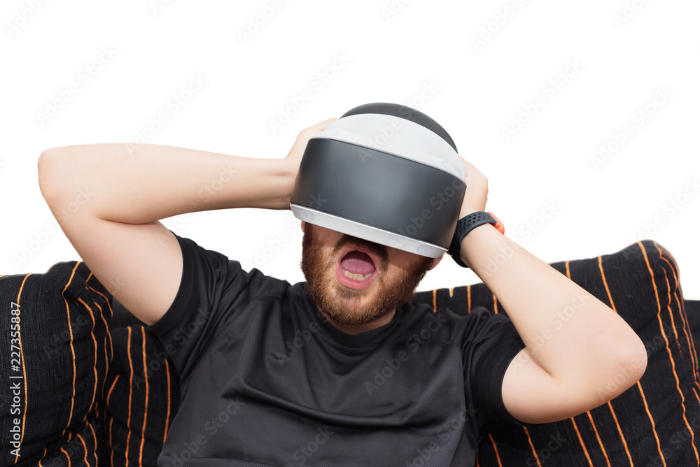 Bearded man wearing virtual reality goggles on white isolated background Bearded man wearing virtual reality goggles on white isolated background