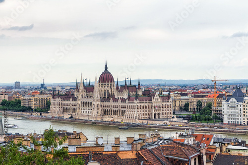 View from above on the Budapest city and Hungarian Parliament Building on the bank of the Danube river