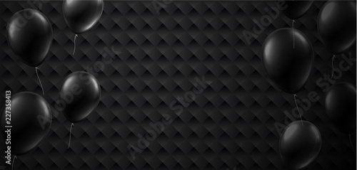Black textured background with balloons. Holiday decoration.