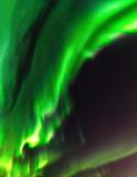 Close up high definition photo of very bright green with some magenta nuances aurora with stars shining behind it, looks like heavy smoke arising up to skies, north Sweden, no clouds, good background