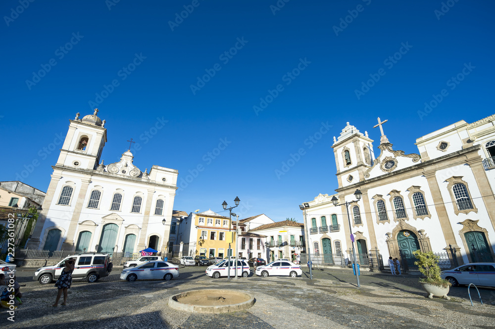 Bright scenic morning view of the classic colonial churches lining the Largo Terreiro de Jesus in Pelourinho, Salvador, Bahia, Brazil