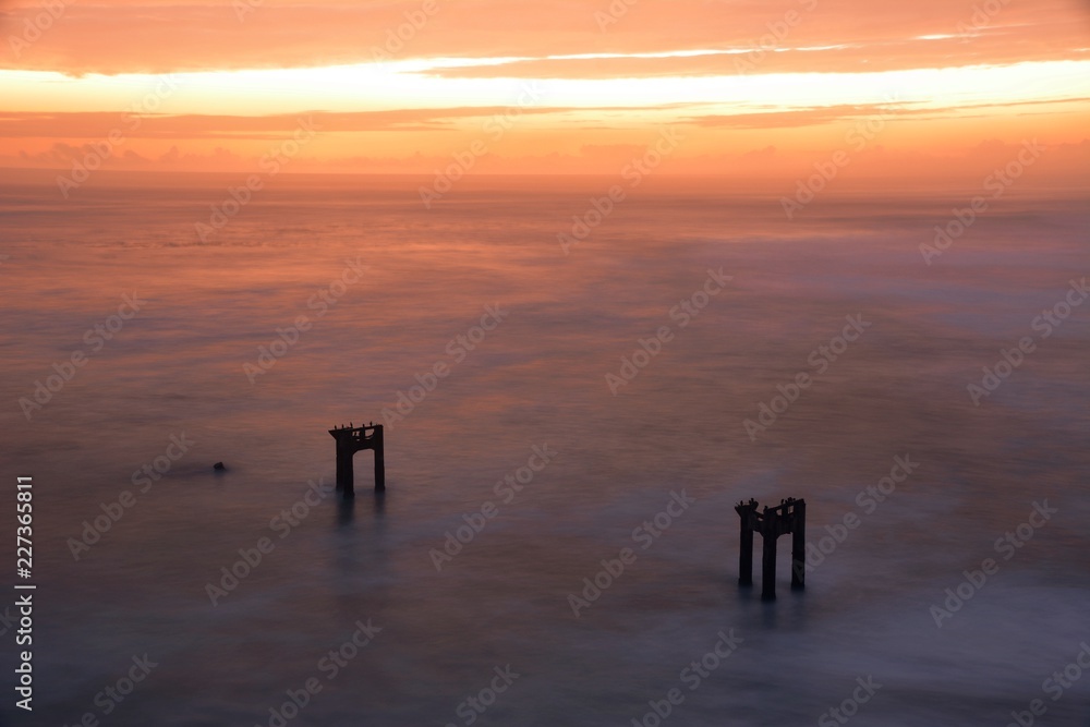 Fototapeta premium Abandoned pier at sunset