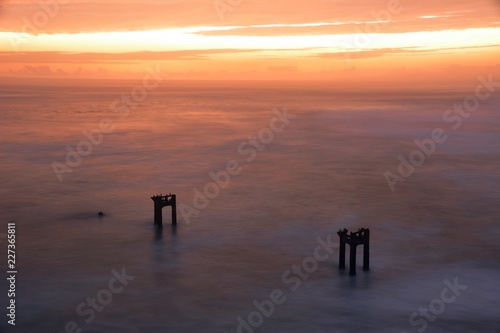 Abandoned pier at sunset © Calvin
