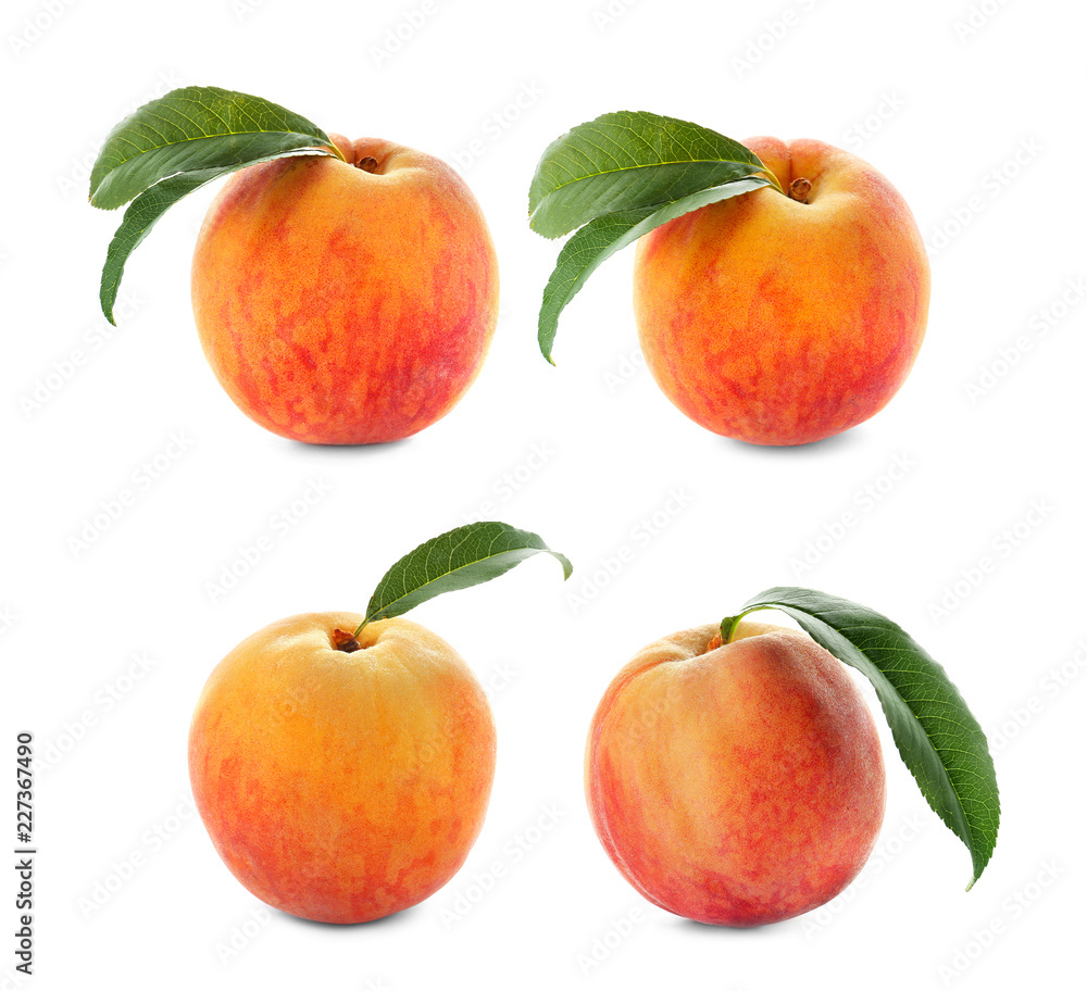 Fototapeta Set with juicy ripe peaches and green leaves on white background