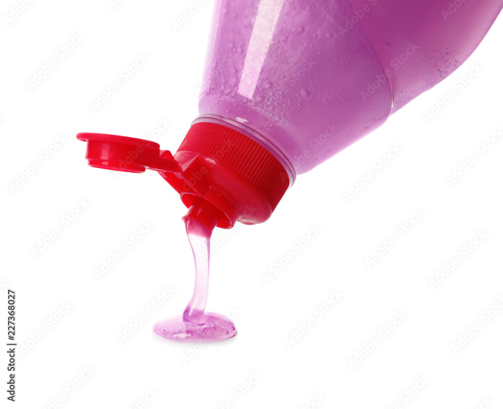 Pouring cleaning product for dish washing on white background, closeup Pouring cleaning product for dish washing on white background, closeup