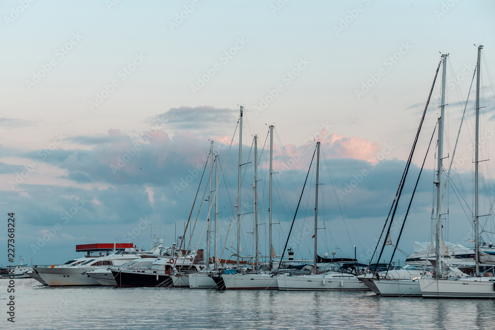 Yachts and boats on the pier