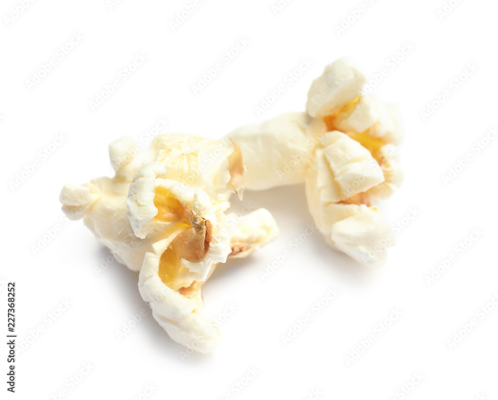 Delicious fresh popcorn on white background, closeup Delicious fresh popcorn on white background, closeup