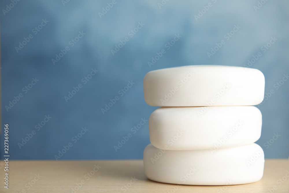 Stack of soap bars on table. Space for text Stack of soap bars on table. Space for text