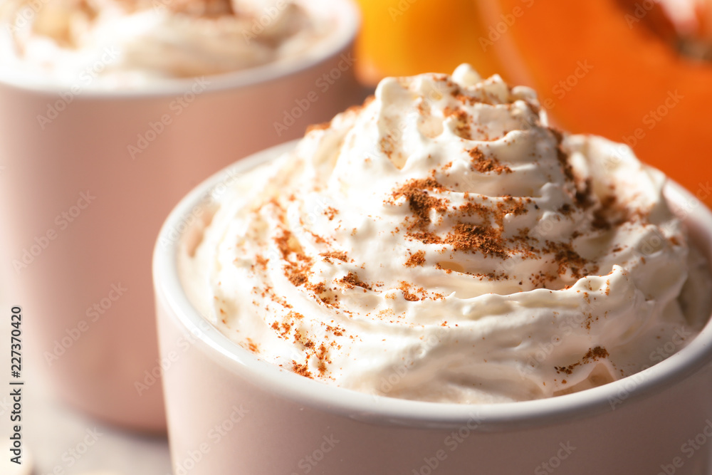 Cup with tasty pumpkin spice latte, closeup Cup with tasty pumpkin spice latte, closeup