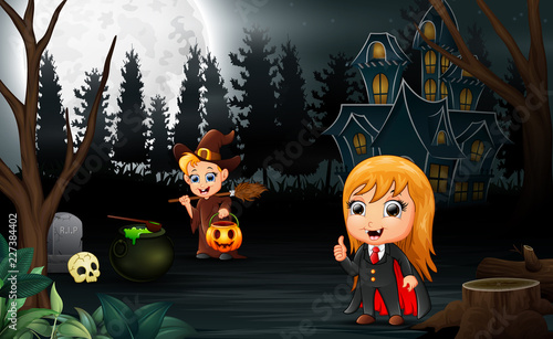 Happy halloween with vampire and witch cartoon photo