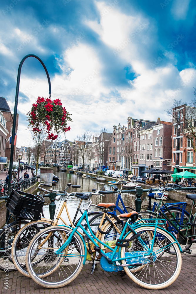 Bikes, canals, flowers and architecture at the Old Central district of Amsterdam