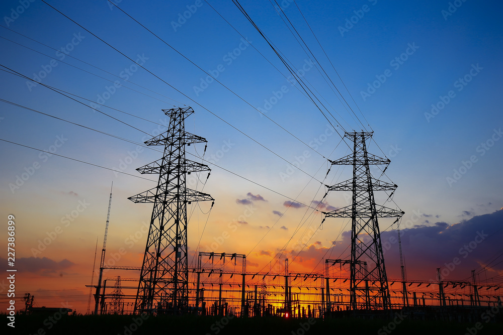 Electric tower, silhouette at sunset