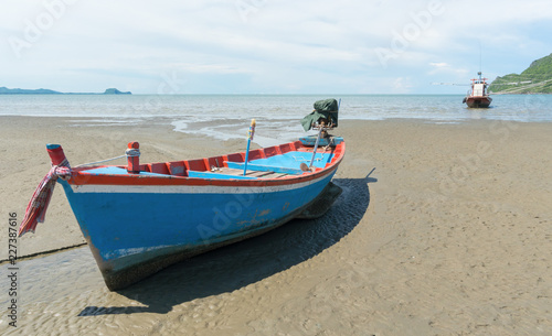 Blue Fishing Boat on Sam Roi Yod Beach Prachuap Khiri Khan Thailand Left 3