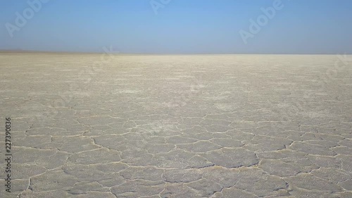 Somewhere in nowhere, somewhere in  the end of the world, somewhere in the white color, salt lake. photo