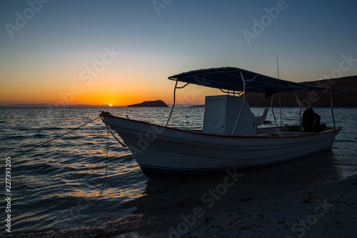 Fishing boat at sunset © Andrew