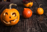 on the wooden floor pumpkin as a symbol of Halloween