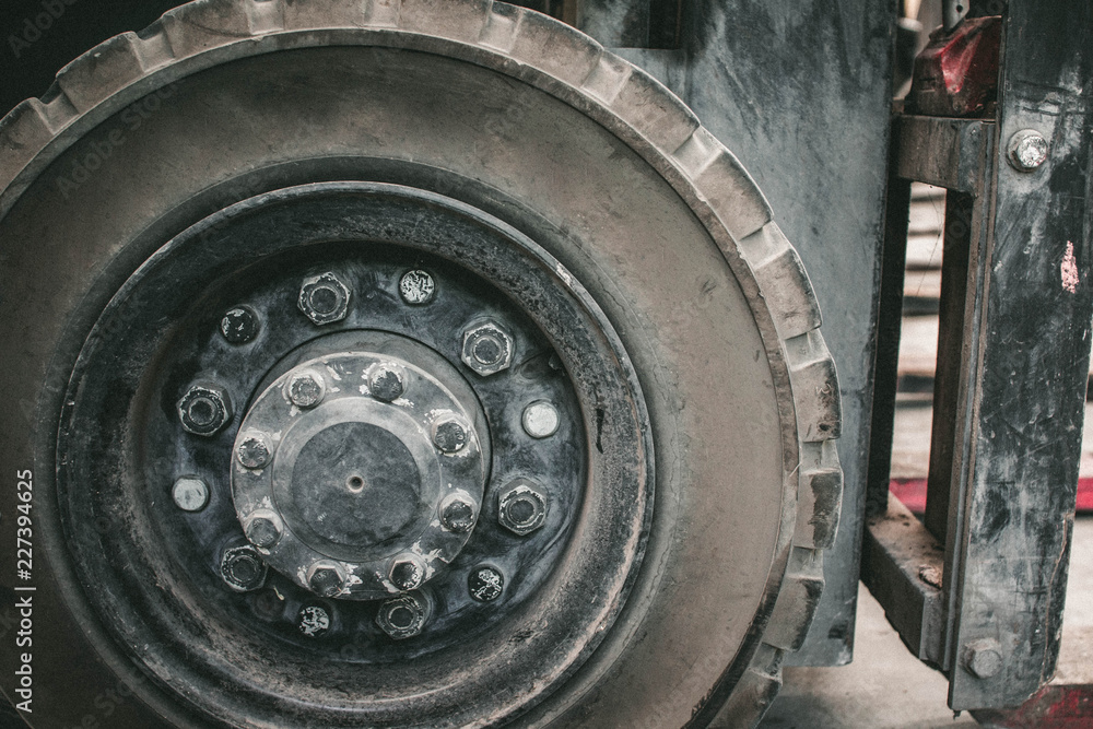 The front wheels of the forklift. The front wheels of the forklift.