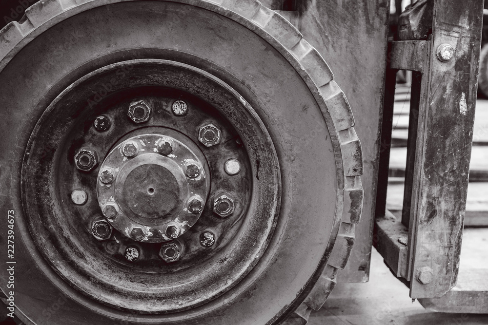 The front wheels of the forklift. The front wheels of the forklift.