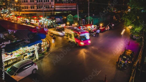 Chiang mai, Thailand, May 29 2016, Timelaps of the Traffic At Warorot Market in the night photo