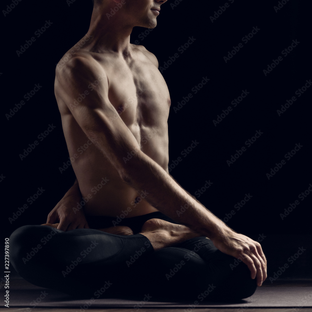 Yogi relaxed man with muscular body training Yogi relaxed man with muscular body training