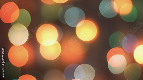 Colorful sparkling bokeh and flashing new year lights in soft focus. Abstract sparkling © Azhorov
