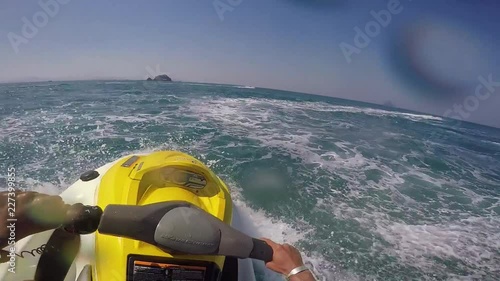 Video in first person going fast on a jet ski in Thailand Phuket on a sunny day. Vacation living life. 60FPS. Clip 17 photo