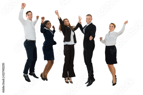 Businesspeople Jumping In Joy