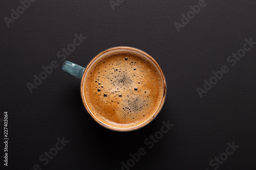 Фотография Cup of coffee on black background