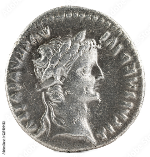 Ancient Roman silver denarius coin of Emperor Tiberius. Obverse.