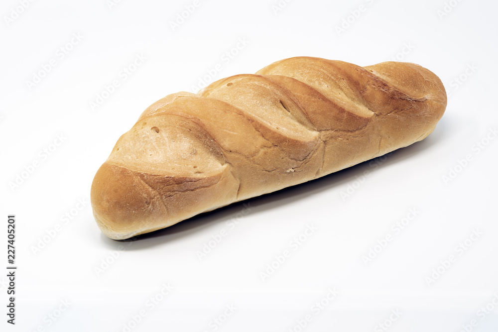 Freshly baked French bread isolated on white background. Freshly baked French bread isolated on white background.