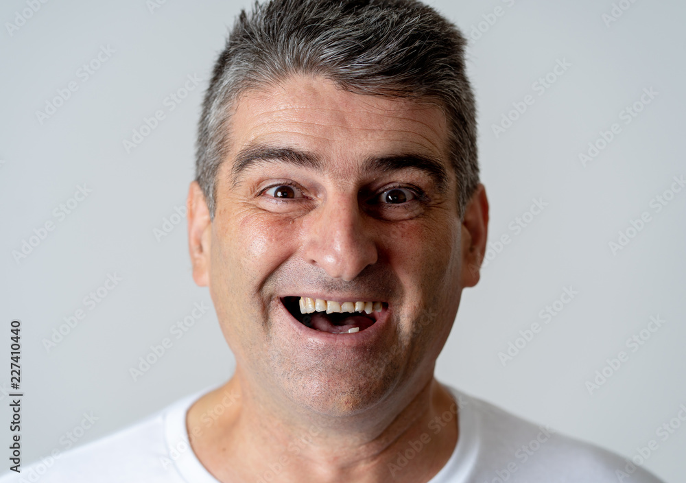 Close up portrait of surprised and happy man celebrating victory and wining lottery Close up portrait of surprised and happy man celebrating victory and wining lottery