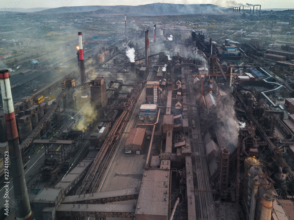 Panoramic view of heavy industry with detrimental impact on nature; CO2