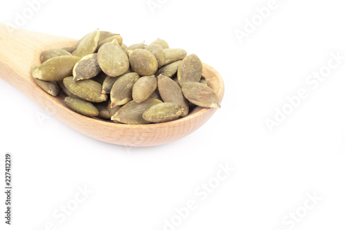 Pumpkin seeds on a white background