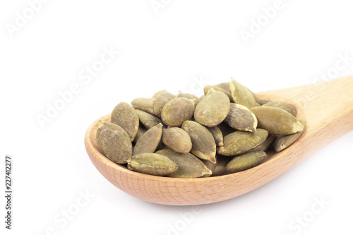 Pumpkin seeds on a white background