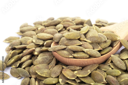 Pumpkin seeds on a white background