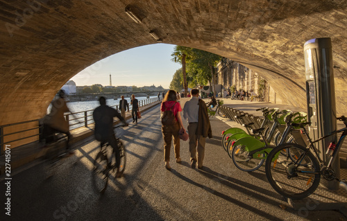 Bicycles for rent under Pont Neuf bridge on the Seine river bank