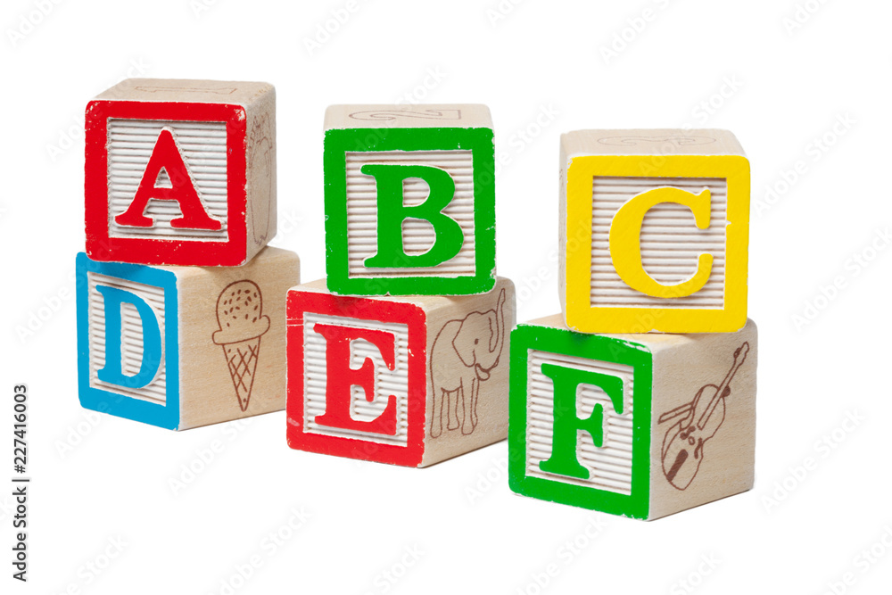 Wooden alphabet blocks isolated on white background Wooden alphabet blocks isolated on white background