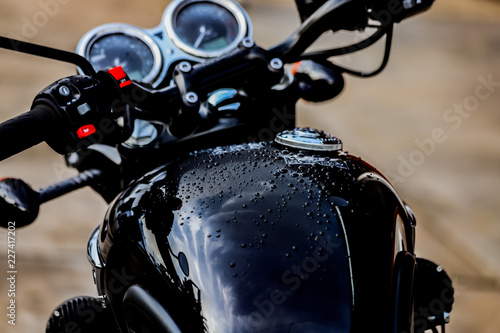 Water droplets on motorcycle fuel tank